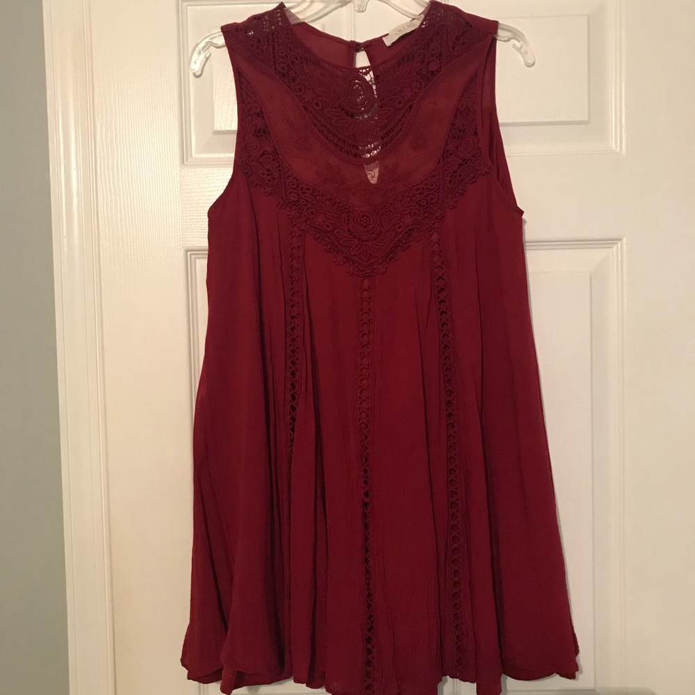 Red dress with lace detail.